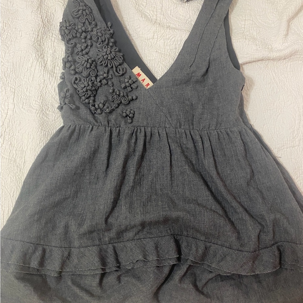 Sleeveless Marni shirt with floral appliqué. US size 10. European size 44.